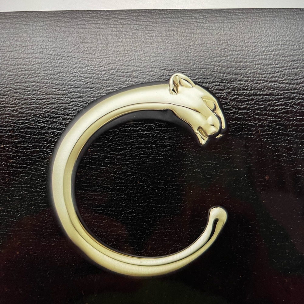CARTIER Bleak leather hand bag. Also has Matching crossover strap